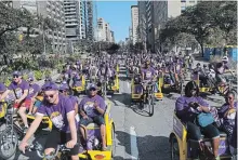  ?? RENE JOHNSTON TORONTO STAR ?? Service Employees Internatio­nal Union members celebrate Labour Day on Monday with a parade through the streets of Toronto.