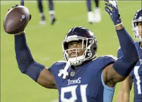  ?? AP FILE ?? Former Titans tight end Jonnu smith celebrates after scoring a touchdown against the Bills on Oct. 13, 2020.