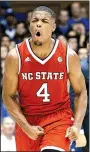  ?? AP/GERRY BROOME ?? Former North Carolina Statepoint guard Dennis Smith Jr. led the Wolfpack to their first victory at Duke’s Cameron Indoor Stadium in 22 seasons.