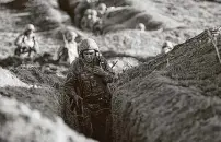  ?? Armenian Defense Ministry Press Service / Associated Press ?? Armenian soldiers take their position on the front line Tuesday in Tavush region, Armenia. Skirmishes on the volatile Armenia-Azerbaijan border escalated Tuesday.