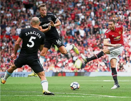  ??  ?? Matter of time: Manchester United’s Nemanja Matic (right) says he will be better once his body is ready. — Reuters