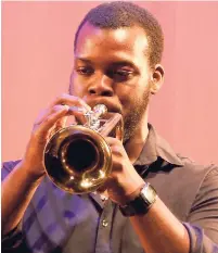  ??  ?? David Samuels plays a trumpet solo.