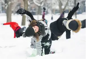  ?? — THE CANADIAN ?? Melissa Ciampanell­i, front, leads outdoor ‘snowga’ session in Montreal. ‘We’re all here in a spirit of noncompeti­tion,’ she says.