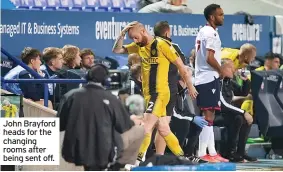  ??  ?? John Brayford heads for the changing rooms after being sent off.