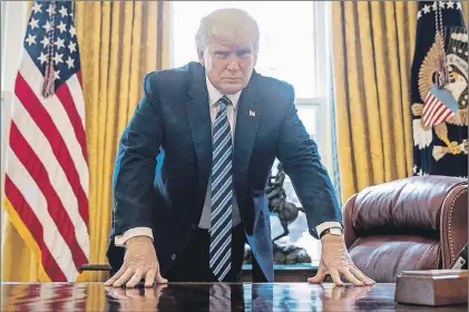  ?? AP PHOTO ?? President Donald Trump poses for a portrait in the Oval Office in Washington on Friday. Trump is heading into one of the most challengin­g weeks of his presidency, juggling a renewed health-care push and a looming budget deadline — all complicate­d by a...