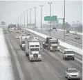  ?? SHELLEY MAYS/USA TODAY NETWORK ?? Cool Springs, Tenn., is quite a bit cooler as traffic negotiates the snow on I-65 Tuesday near Nashville.