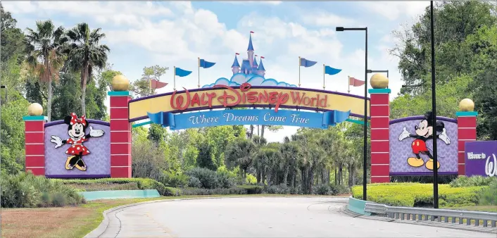  ?? JOE BURBANK/TNS ?? An empty entrance to Walt Disney World on March 24. The NBA is using the ESPN Wide World of Sports Complex at Disney World as a venue to complete the season.