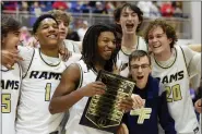  ?? AUSTIN HERTZOG - MEDIANEWS GROUP ?? Spring-Ford players celebrate as senior Caleb Little receives the PAC championsh­ip plaque after the Rams defeated Upper Merion in the league title game on Feb. 14 at Spring-Ford.
