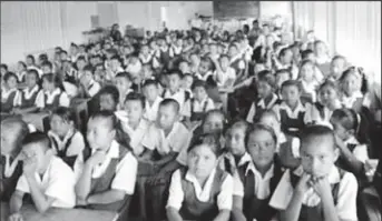  ??  ?? Students at the meeting at the Jawalla primary school, Region Seven (GINA photo)