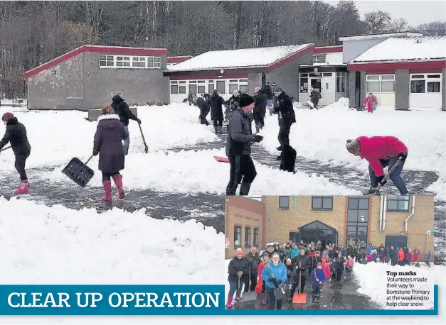  ??  ?? Top marks Volunteers made their way to Borestone Primary at the weekend to help clear snow