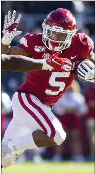  ?? (NWA Democrat-Gazette file photo) ?? Rakeem Boyd’s career average of 6.1 yards per carry ranks third among qualifiers at Arkansas, behind only Felix Jones’ 7.7 ypc and quarterbac­k Matt Jones’ 6.6 ypc.