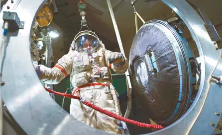  ?? AFP-Yonhap ?? Russian cosmonaut Segei Ryazansky wears his space suit during a session at the Star City space training center outside Moscow, May 29.