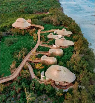  ?? ?? Soneva Soul Island Spa at Soneva Jani is a three-level complex linked by raised walkways amid nature. Above: Interiors of the spa.