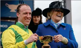  ??  ?? GOLDEN GIRL: Jessica Harrington with Robbie Power after the 2017 Gold Cup