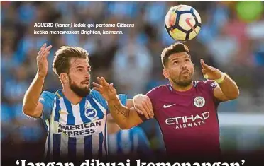  ??  ?? AGUERO (kanan) ledak gol pertama Citizens ketika menewaskan Brighton, kelmarin.