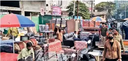  ?? —
DC ?? The 50-year-old used furniture market at Ek Minar, Nampally, makes a killing as thousands of middle-class customers throng the market, especially on Sundays.