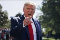  ?? EVAN VUCCI — THE ASSOCIATED PRESS ?? President Donald Trump talks to reporters on the South Lawn of the White House in Washington. Trump is showcasing the growing effort to capitalize on western Pennsylvan­ia’s natural gas deposits by turning gas into plastics.