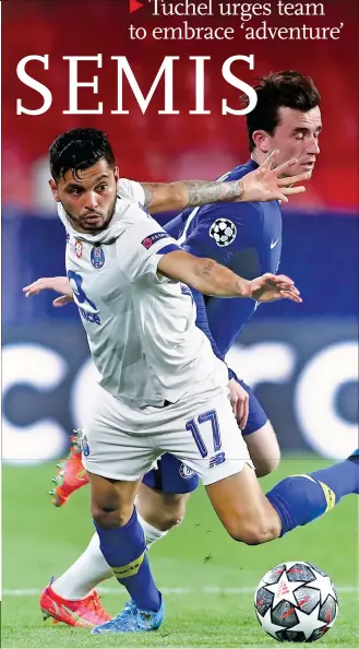  ?? Photo: VCG AFP ?? Jesus Corona ( left) of Porto competes with Ben Chilwell of Chelsea on Tuesday in Seville, Spain.