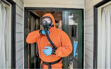  ?? PHOTO: BRADEN FASTIER/STUFF ?? Methamphet­amine clean up expert Sean Johnson gears up for the job.