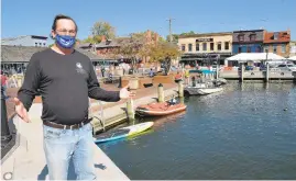  ??  ?? Doug Myers, Maryland senior scientist at the Chesapeake Bay Foundation, speaks about sea level rise and the effects on Annapolis and Anne Arundel County, at City Dock in Annapolis.