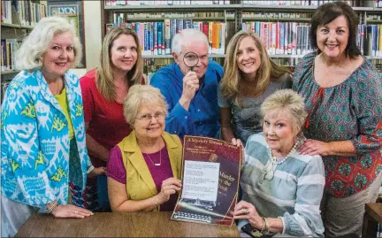  ?? WILLIAM HARVEY/THREE RIVERS EDITION ?? Board members of the Independen­ce County Library Friends Foundation, seated from left, are Mary Beth Frensley and Ann Merrell with Sarah Jones, standing from left, Donna Cole, Chuck Jones, Vicki Lowery and Vanessa Adams as they get ready for the...