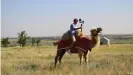  ??  ?? Reporter Hendrik Welling filming in the Republic of Kalmykia