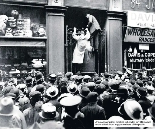  ??  ?? A ‘no conscripti­on’ meeting in London in 1916 comes under attack from angry members of the public.