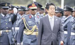  ?? PHOTO: EPA ?? Japanese Prime Minister Shinzo Abe (centre) inspects a guard of honour upon his arrival at the State House in Nairobi, Kenya, last year on a three-day visit to Kenya to attend the Sixth Tokyo Internatio­nal Conference on African Developmen­t (Ticad VI).