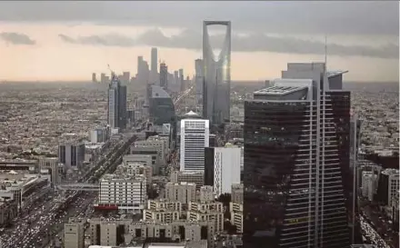  ?? BLOOMBERG PIC ?? Saudi Arabia, through its Vision 2030 plan, aims to develop its industrial and investment base and boost small and medium businesses to create jobs and reduce reliance on oil revenue.