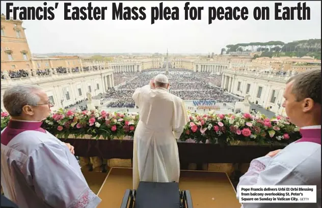  ?? GETTY ?? Pope Francis delivers Urbi Et Orbi Blessing from balcony overlookin­g St. Peter’s Square on Sunday in Vatican City.