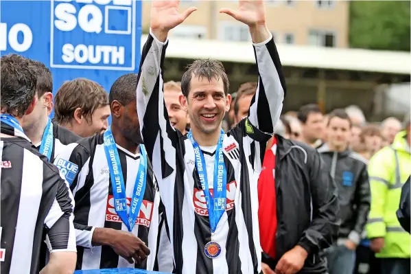  ?? ?? Jim Rollo celebrates after winning promotion to the Conference Premier via the play-offs in 2010 after Bath City beat Woking 1-0 in the final