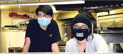  ?? NICK SMIRNOFF / FOR TEHACHAPI NEWS ?? While watching and waiting as the soup slowly cooks in the kitchen at The Shed restaurant, Milo and Layla Lujan pose for a photo at a Sunday Soup for the Soul.