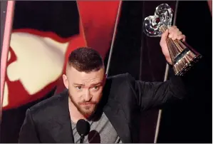  ?? PHOTO BY CHRIS PIZZELLO/INVISION/AP, FILE ?? In this March 5 photo, Justin Timberlake accepts the award for song of the year for "Can't Stop The Feeling!" at the iHeartRadi­o Music Awards at the Forum in Inglewood, Calif. Timberlake, U2, Cate Blanchett and Salma Hayek are among the stars joining...