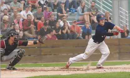  ?? GARY NYLANDER/Special to The Daily Courier ?? Kelowna Falcons’ Davis Todosichuk bunts against the Corvallis Knights during first-inning action at Elks Stadium on Tuesday evening.