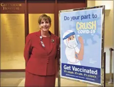  ?? Tyler Sizemore / Hearst Connecticu­t Media ?? Greenwich Hospital President and Chief Operating Officer Diane Kelly after front-line caregivers were administer­ed the COVID-19 vaccine at Greenwich Hospital on Wednesday.