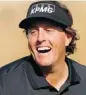  ?? HUNTER MARTIN/GETTY IMAGES ?? Phil Mickelson has a laugh on the 15th hole, but wasn’t smiling after he missed a putt on the 18th.