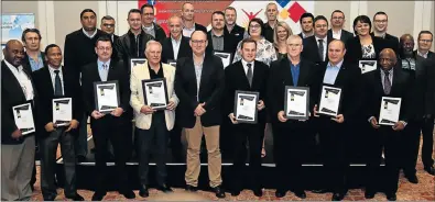  ?? Picture: EUGENE COETZEE ?? COMPANIES RECOGNISED: Mayor Athol Trollip, front, centre, is pictured with the award recipients