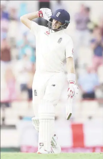  ??  ?? England captain Joe Root led from the front carving out his 16th test ton to put his team in a virtually impregnabl­e position at yesterday’s close of play.