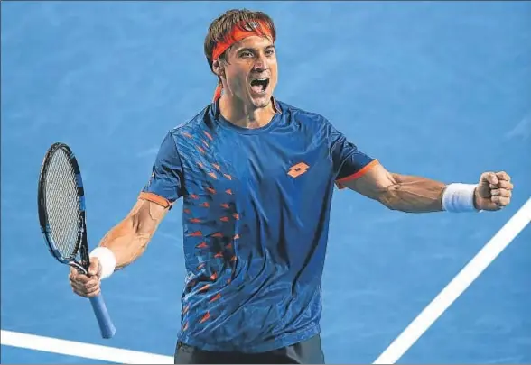  ?? MAST IRHAM / EFE ?? David Ferrer celebrando su victoria contra John Isner, ayer en Melbourne