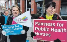  ?? CLIFFORD SKARSTEDT EXAMINER ?? Peterborou­gh Public Health Nurses hold an informatio­n picket outside Jackson Square prior to the board of health meeting on Nov. 14.