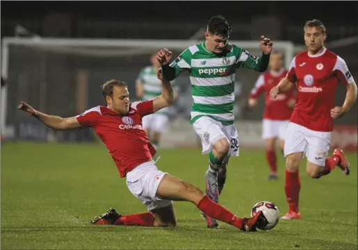  ??  ?? Craig Roddan dispossess­es Trevor Clarke during Friday night’s 1-1 draw. Pic: George Kelly Photograph­y.