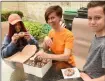  ?? PHOTO PROVIDED ?? Attendees enjoy vegan donuts at the 2018 Albany VegFest.