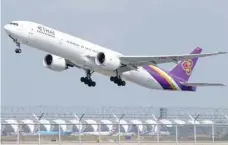  ?? — Reuters ?? A Thai Airways plane takes off from Bangkok’s Suvarnabhu­mi Airport.