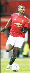  ??  ?? Manchester United’s Paul Pogba takes the ball forward during the English FA Cup 4th round soccer match between Manchester United and Liverpool at Old Trafford in Manchester, England on Jan 24. (AP)