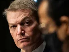 ?? Demetrius Freeman/Pool/AFP via Getty Images ?? FireEye CEO Kevin Mandia listens during a Senate hearing in Washington on Feb. 23. The White House does not plan to boost internet oversight, despite foreign hackers’ abuse.