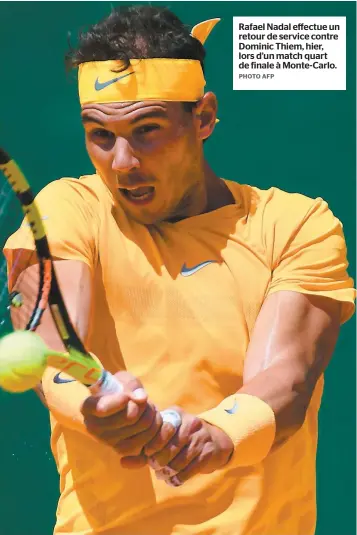  ?? PHOTO AFP ?? Rafael Nadal effectue un retour de service contre Dominic Thiem, hier, lors d’un match quart de finale à Monte-Carlo.