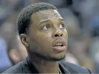  ??  ?? Toronto Raptors injured guard Kyle Lowry watches his team’s 100-78 win over the Dallas Mavericks from the bench on March 13. Lowry’s return would dramatical­ly alter the state of the Raptors heading into the playoffs.