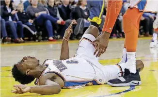  ?? [AP PHOTO] ?? Thunder guard Hamidou Diallo was a diagnosed with a left ankle sprain Thursday after crashing to the court Wednesday at Golden State.