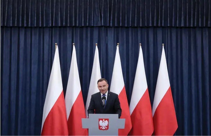  ??  ?? POLISH PRESIDENT Andrzej Duda speaks about his decision on the Holocaust bill at the Presidenti­al Palace in Warsaw.