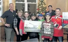  ?? SPECIAL TO THE EXAMINER ?? Members of the Ennismore Eagles Pee Wee division donated items for boxes to be sent to members of the military in Iraq and Egypt with help from the Yellow Ribbon Campaign.